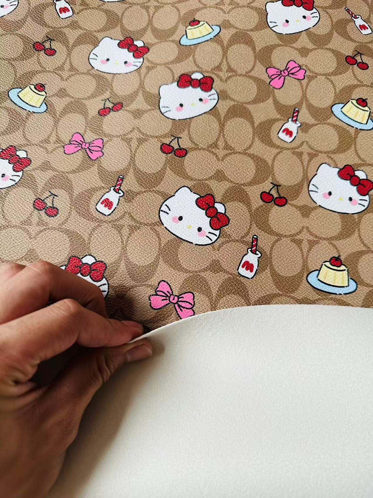 Fashion Hello Kitty With Coach Cake Design Leather Fabric For Handmade Handicraft By Yards